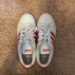 White and Red stripped Adidas